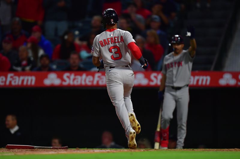 Jun 24, 2025; Anaheim, California, USA; Boston Red Sox center fielder Ceddanne Rafaela (3) scores a run against the Los Angeles Angels during the tenth inning at Angel Stadium. Mandatory Credit: Gary A. Vasquez-Imagn Images