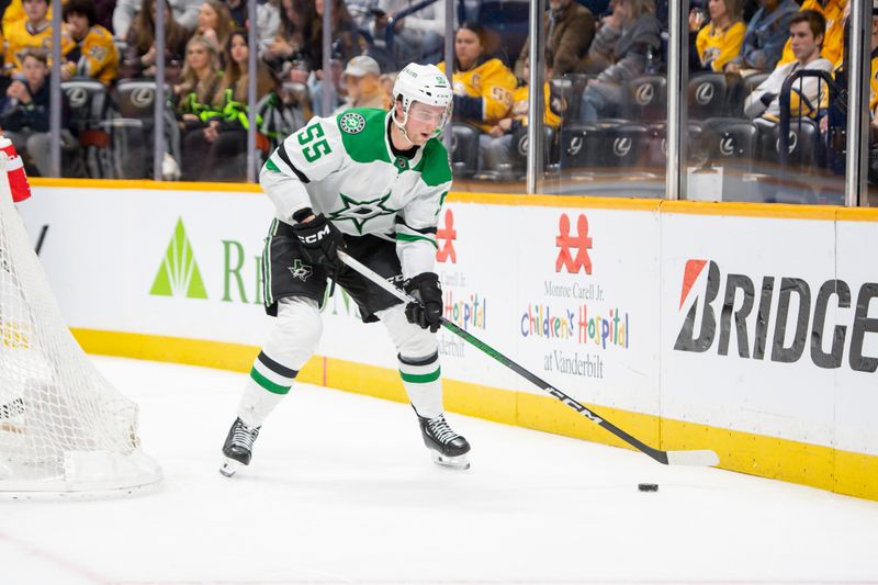 Feb 15, 2024; Nashville, Tennessee, USA; Dallas Stars defenseman Thomas Harley (55) skates with the puck  against the Nashville Predators during the second period at Bridgestone Arena. Mandatory Credit: Steve Roberts-USA TODAY Sports