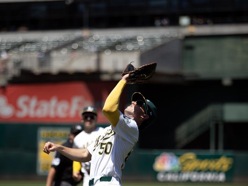 Jul 6, 2024; Oakland, California, USA; Oakland Athletics first baseman Armando Alvarez (50) makes the catch of a foul popup by Baltimore Orioles third baseman Ramón Urías (not pictured) during the fourth inning at Oakland-Alameda County Coliseum. Mandatory Credit: D. Ross Cameron-USA TODAY Sports