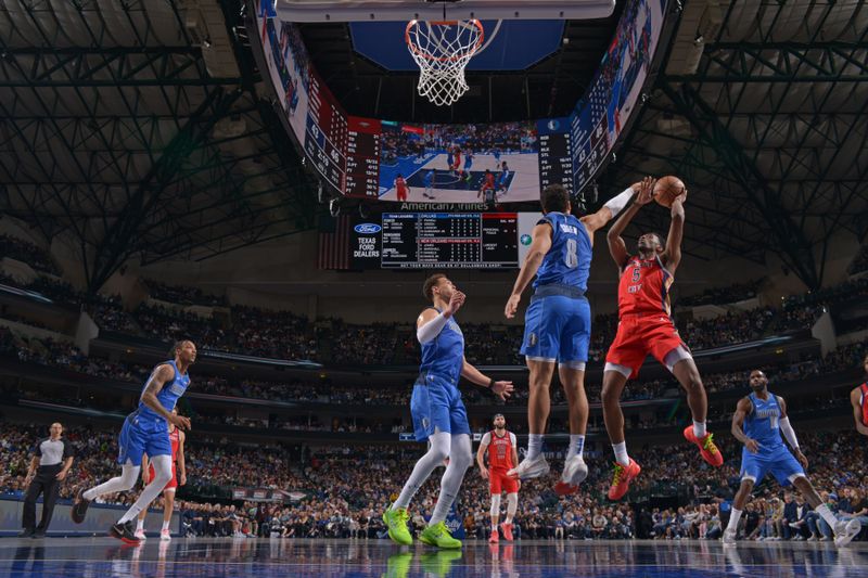 DALLAS, TX - JANUARY 13: Herb Jones #5 of the New Orleans Pelicans shoots the ball during the game against the Dallas Mavericks on January 13, 2024 at the American Airlines Center in Dallas, Texas. NOTE TO USER: User expressly acknowledges and agrees that, by downloading and or using this photograph, User is consenting to the terms and conditions of the Getty Images License Agreement. Mandatory Copyright Notice: Copyright 2024 NBAE (Photo by Glenn James/NBAE via Getty Images)