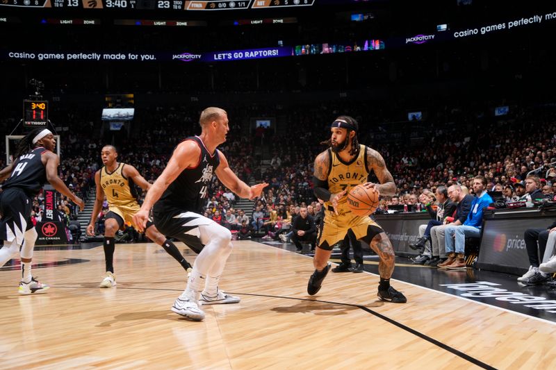 TORONTO, CANADA - JANUARY 26: Gary Trent Jr. #33 of the Toronto Raptors dribbles the ball during the game against the LA Clippers on January 26, 2024 at the Scotiabank Arena in Toronto, Ontario, Canada.  NOTE TO USER: User expressly acknowledges and agrees that, by downloading and or using this Photograph, user is consenting to the terms and conditions of the Getty Images License Agreement.  Mandatory Copyright Notice: Copyright 2024 NBAE (Photo by Mark Blinch/NBAE via Getty Images)