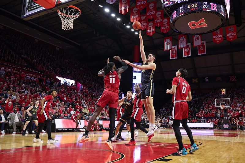 Jan 28, 2024; Piscataway, New Jersey, USA; Purdue Boilermakers center Zach Edey (15) shoots the ball asRutgers Scarlet Knights center Clifford Omoruyi (11) defends during the first half at Jersey Mike's Arena. Mandatory Credit: Vincent Carchietta-USA TODAY Sports