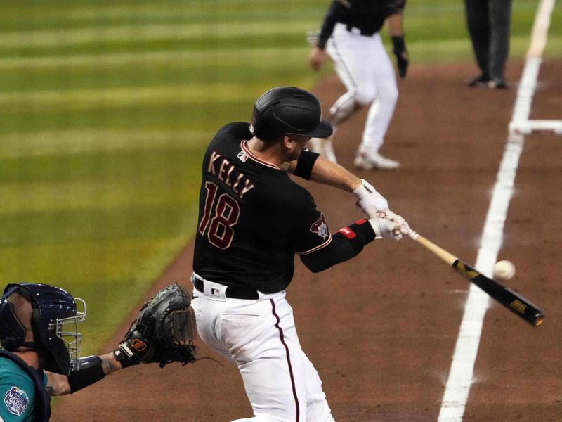 Jul 29, 2023; Phoenix, Arizona, USA; Arizona Diamondbacks catcher Carson Kelly (18) hits an RBI single to drive in Arizona Diamondbacks center fielder Alek Thomas (5) from third base during the fifth inning at Chase Field. Mandatory Credit: Joe Camporeale-USA TODAY Sports