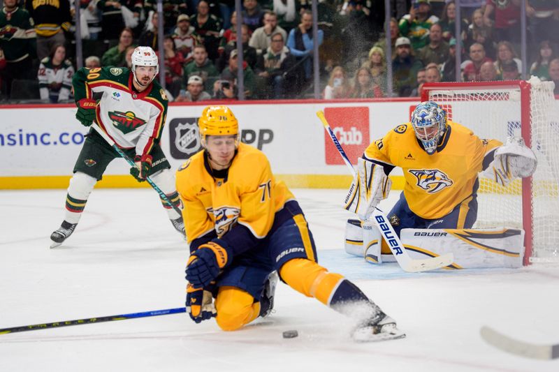 Nov 4, 2025; Saint Paul, Minnesota, USA; Nashville Predators defenseman Brady Skjei (76) tries to block the game winning assist pass from Minnesota Wild left wing Kirill Kaprizov (97) to left wing Marcus Johansson (90) who scored in overtime at Grand Casino Arena. Mandatory Credit: Matt Blewett-Imagn Images