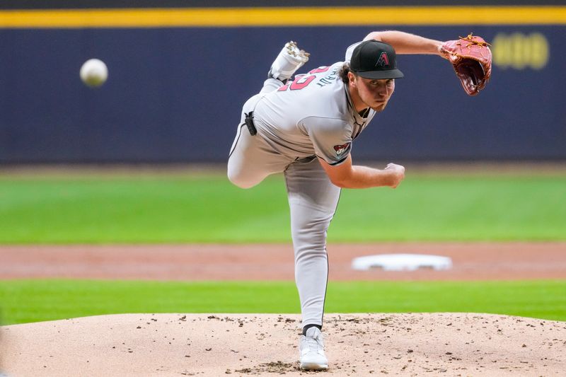 Sep 19, 2024; Milwaukee, Wisconsin, USA;  Arizona Diamondbacks pitcher Brandon Pfaadt (32) throws a pitch during the first inning against the Milwaukee Brewers at American Family Field. Mandatory Credit: Jeff Hanisch-Imagn Images