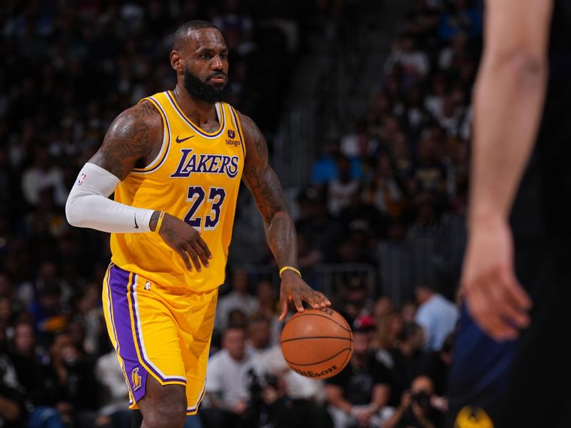 DENVER, CO - APRIL 22: LeBron James #23 of the Los Angeles Lakers handles the ball during the game against the Denver Nuggets on April 22, 2024 at the Ball Arena in Denver, Colorado. NOTE TO USER: User expressly acknowledges and agrees that, by downloading and/or using this Photograph, user is consenting to the terms and conditions of the Getty Images License Agreement. Mandatory Copyright Notice: Copyright 2024 NBAE (Photo by Bart Young/NBAE via Getty Images)