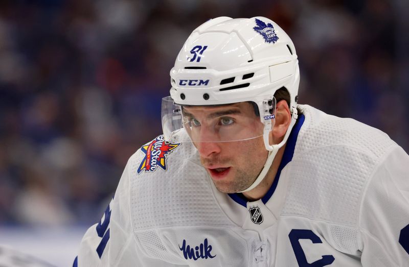 Dec 21, 2023; Buffalo, New York, USA;  Toronto Maple Leafs center John Tavares (91) waits for the face-off during the first period against the Buffalo Sabres at KeyBank Center. Mandatory Credit: Timothy T. Ludwig-USA TODAY Sports