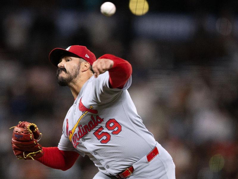 Sep 22, 2025; San Francisco, California, USA; St. Louis Cardinals pitcher JoJo Romero (59) delivers a pitch against the San Francisco Giants during the ninth inning at Oracle Park. Mandatory Credit: D. Ross Cameron-Imagn Images