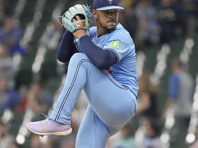 Jun 10, 2024; Milwaukee, Wisconsin, USA;  Toronto Blue Jays pitcher Jose Berrios (17) throws a pitch during the first inning against the Milwaukee Brewers at American Family Field. Mandatory Credit: Jeff Hanisch-USA TODAY Sports