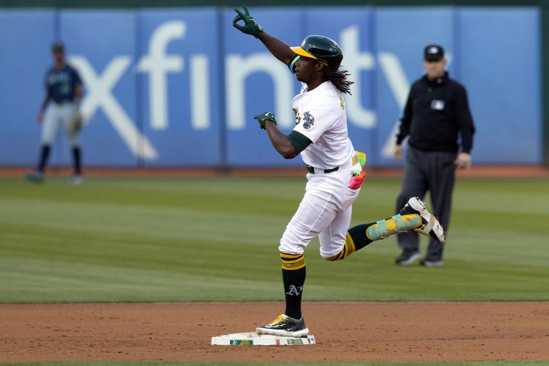 Sep 3, 2024; Oakland, California, USA; Oakland Athletics right fielder Lawrence Butler (4) runs out his solo home run against the Seattle Mariners during the first inning at Oakland-Alameda County Coliseum. Mandatory Credit: D. Ross Cameron-Imagn Images