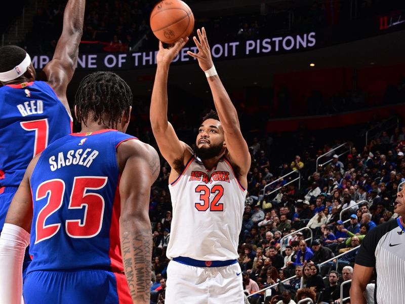 DETROIT, MI - NOVEMBER 1: Karl-Anthony Towns #32 of the New York Knicks shoots the ball during the game against the Detroit Pistons on November 1, 2024 at Little Caesars Arena in Detroit, Michigan. NOTE TO USER: User expressly acknowledges and agrees that, by downloading and/or using this photograph, User is consenting to the terms and conditions of the Getty Images License Agreement. Mandatory Copyright Notice: Copyright 2024 NBAE (Photo by Chris Schwegler/NBAE via Getty Images)