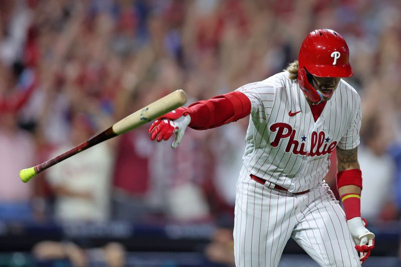 Oct 4, 2023; Philadelphia, Pennsylvania, USA; Philadelphia Phillies second baseman Bryson Stott (5) reacts after hitting  a grand slam against the Miami Marlins during the sixth inning for game two of the Wildcard series for the 2023 MLB playoffs at Citizens Bank Park. Mandatory Credit: Bill Streicher-USA TODAY Sports