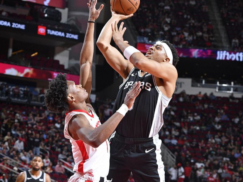 HOUSTON, TX - MARCH 5:  Keldon Johnson #3 of the San Antonio Spurs shoots the ball during the game against the Houston Rockets on March 5, 2024 at the Toyota Center in Houston, Texas. NOTE TO USER: User expressly acknowledges and agrees that, by downloading and or using this photograph, User is consenting to the terms and conditions of the Getty Images License Agreement. Mandatory Copyright Notice: Copyright 2024 NBAE (Photo by Logan Riely/NBAE via Getty Images)