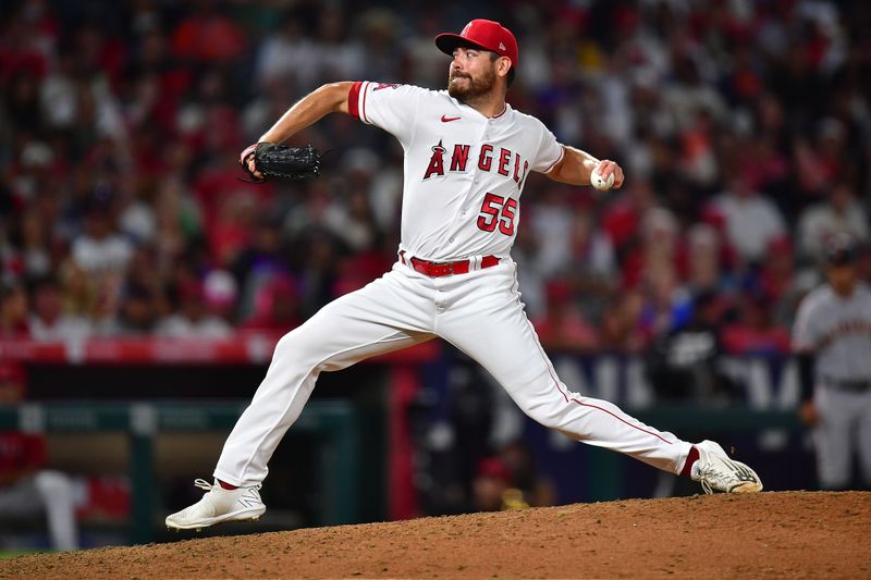 Aug 7, 2023; Anaheim, California, USA; Los Angeles Angels relief pitcher Matt Moore (55) throws against the San Francisco Giants during the seventh inning at Angel Stadium. Mandatory Credit: Gary A. Vasquez-USA TODAY Sports