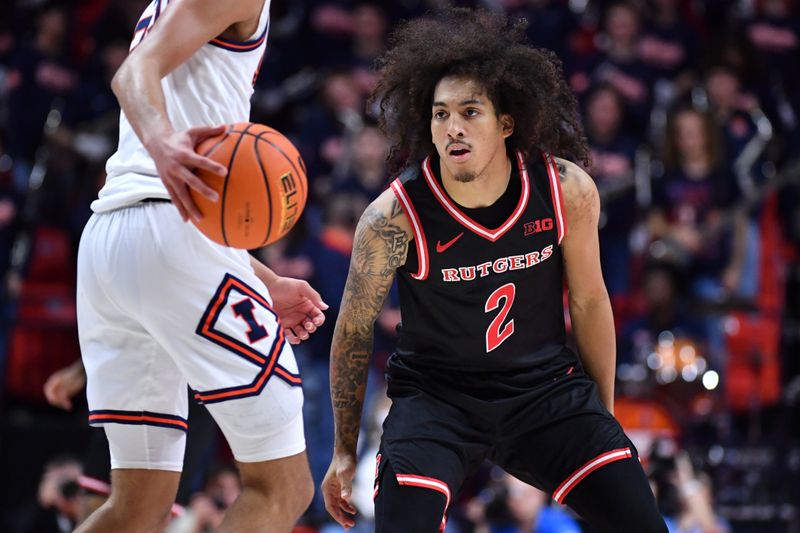 Jan 8, 2026; Champaign, Illinois, USA;  Rutgers Scarlet Knights guard Lino Mark (2) eyes the basketball as Illinois Fighting Illini guard Keaton Wagler (23) brings the ball up the court during the second half at State Farm Center. Mandatory Credit: Ron Johnson-Imagn Images
