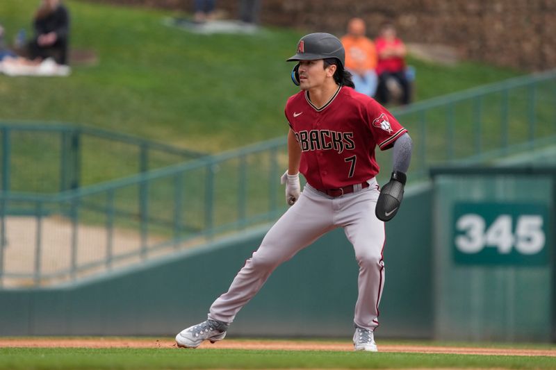 Mar 20, 2023; Phoenix, Arizona, USA; Arizona Diamondbacks left fielder Corbin Carroll (7) leads off second base against the Chicago White Sox in the first inning at Camelback Ranch-Glendale. Mandatory Credit: Rick Scuteri-USA TODAY Sports