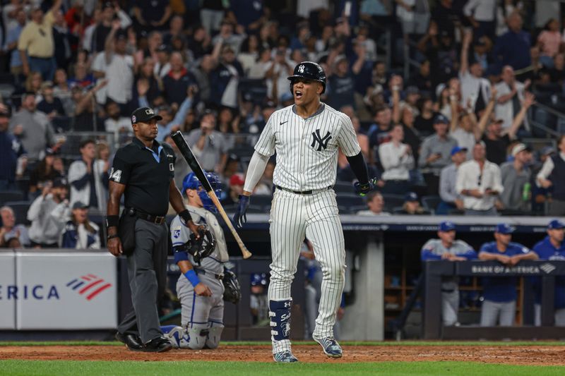 Sep 11, 2024; Bronx, New York, USA; New York Yankees right fielder Juan Soto (22) reacts after his two run home run during the sixth inning against the Kansas City Royals at Yankee Stadium. Mandatory Credit: Vincent Carchietta-Imagn Images