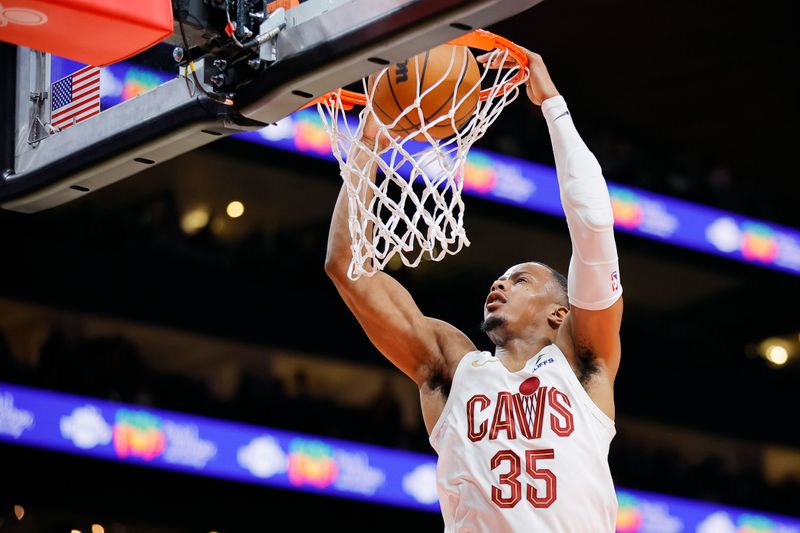 ATLANTA, GEORGIA - JANUARY 20: Isaac Okoro #35 of the Cleveland Cavaliers scores over the Atlanta Hawks during the first half at State Farm Arena on January 20, 2024 in Atlanta, Georgia. NOTE TO USER: User expressly acknowledges and agrees that, by downloading and or using this photograph, User is consenting to the terms and conditions of the Getty Images License Agreement. (Photo by Alex Slitz/Getty Images)