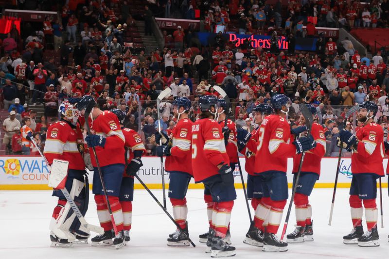 Oct 9, 2025; Sunrise, Florida, USA; Florida Panthers celebrate after the game against the Philadelphia Flyers at Amerant Bank Arena. Mandatory Credit: Sam Navarro-Imagn Images