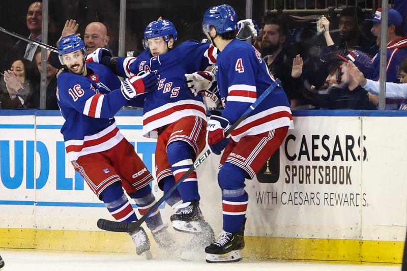 Apr 7, 2024; New York, New York, USA;  New York Rangers left wing Artemi Panarin (10) celebrates with center Vincent Trocheck (16) and defenseman Braden Schneider (4) after scoring a goal in the third period against the Montreal Canadiens at Madison Square Garden. Mandatory Credit: Wendell Cruz-USA TODAY Sports