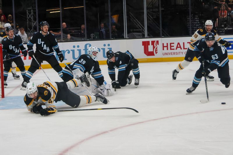 Oct 19, 2024; Salt Lake City, Utah, USA; Matiias Macelli63 clears a Bostonmissed shot at Delta Center. Mandatory Credit: Harry Caston-Imagn Images