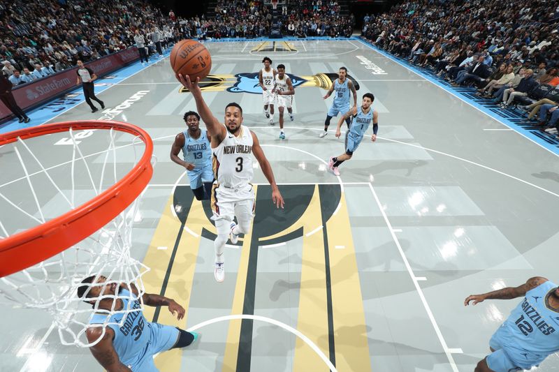 MEMPHIS, TN - NOVEMBER 29: CJ McCollum #3 of the New Orleans Pelicans drives to the basket during the game against the Memphis Grizzlies during the Emirates NBA Cup game on November 29, 2024 at FedExForum in Memphis, Tennessee. NOTE TO USER: User expressly acknowledges and agrees that, by downloading and or using this photograph, User is consenting to the terms and conditions of the Getty Images License Agreement. Mandatory Copyright Notice: Copyright 2024 NBAE (Photo by Joe Murphy/NBAE via Getty Images)