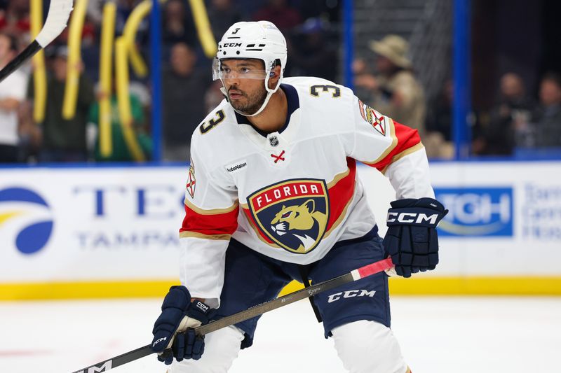 Oct 2, 2025; Tampa, Florida, USA; Florida Panthers defenseman Seth Jones (3) looks on against the Tampa Bay Lightning in the first period at Benchmark International Arena. Mandatory Credit: Nathan Ray Seebeck-Imagn Images