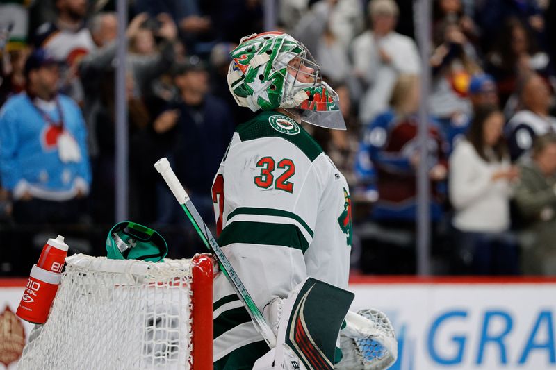 Apr 9, 2024; Denver, Colorado, USA; A hat sits on top of the goal behind goaltender Filip Gustavsson (32) after a hat trick from Colorado Avalanche center Nathan MacKinnon (not pictured) in the second period at Ball Arena. Mandatory Credit: Isaiah J. Downing-USA TODAY Sports