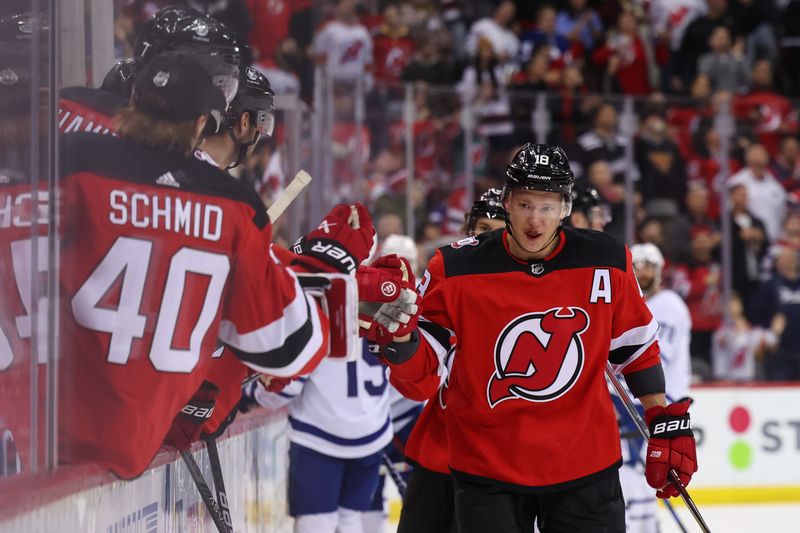 Mar 7, 2023; Newark, New Jersey, USA; New Jersey Devils left wing Ondrej Palat (18) celebrates his goal against the Toronto Maple Leafs during the third period at Prudential Center. Mandatory Credit: Ed Mulholland-USA TODAY Sports