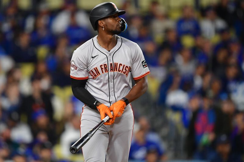 Apr 3, 2024; Los Angeles, California, USA; San Francisco Giants designated hitter Jorge Soler (2) hits a solo home run against the Los Angeles Dodgers during the eighth inning at Dodger Stadium. Mandatory Credit: Gary A. Vasquez-USA TODAY Sports