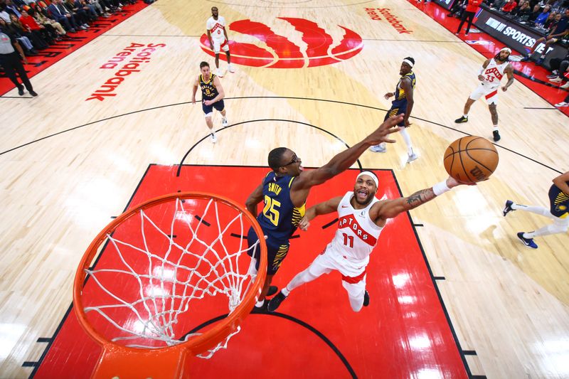 TORONTO, CANADA - APRIL 9:  Bruce Brown #11 of the Toronto Raptors goes to the basket during the game on April 9, 2024 at the Scotiabank Arena in Toronto, Ontario, Canada.  NOTE TO USER: User expressly acknowledges and agrees that, by downloading and or using this Photograph, user is consenting to the terms and conditions of the Getty Images License Agreement.  Mandatory Copyright Notice: Copyright 2024 NBAE (Photo by Vaughn Ridley/NBAE via Getty Images)