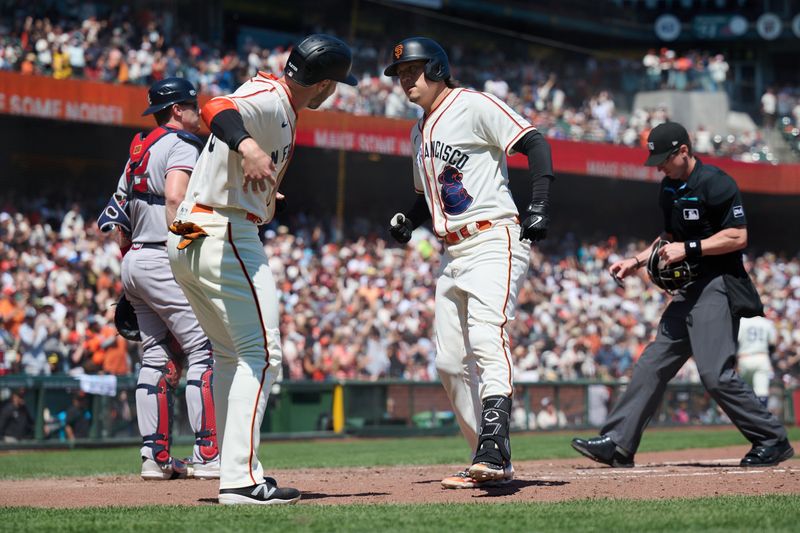 Aug 26, 2023; San Francisco, California, USA; San Francisco Giants infielder Wilmer Flores (41) celebrates with outfielder Austin Slater (13) after hitting a two run home run against the Atlanta Braves during the third inning at Oracle Park. Mandatory Credit: Robert Edwards-USA TODAY Sports