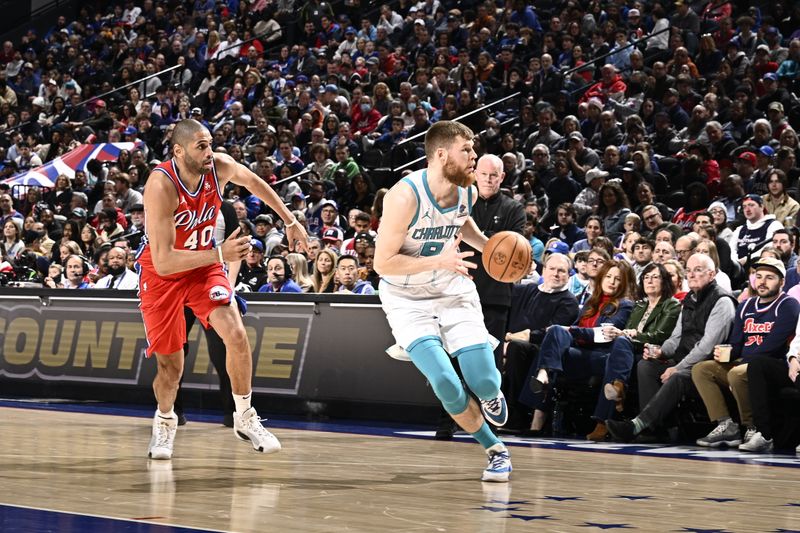 PHILADELPHIA, PA - MARCH 1: Davis Bertans #9 of the Charlotte Hornets handles the ball during the game against the Philadelphia 76ers on March 1, 2024 at the Wells Fargo Center in Philadelphia, Pennsylvania NOTE TO USER: User expressly acknowledges and agrees that, by downloading and/or using this Photograph, user is consenting to the terms and conditions of the Getty Images License Agreement. Mandatory Copyright Notice: Copyright 2024 NBAE (Photo by David Dow/NBAE via Getty Images)