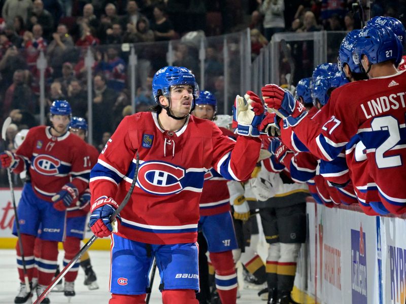 Nov 16, 2023; Montreal, Quebec, CAN; Montreal Canadiens forward Alex Newhook (15) celebrates with teammates after scoring a goal against the Vegas Golden Knights during the first period at the Bell Centre. Mandatory Credit: Eric Bolte-USA TODAY Sports