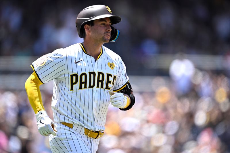 Jun 26, 2024; San Diego, California, USA; San Diego Padres catcher Kyle Higashioka (20) rounds the bases after hitting a two-run home run against the Washington Nationals during the second inning at Petco Park. Mandatory Credit: Orlando Ramirez-USA TODAY Sports