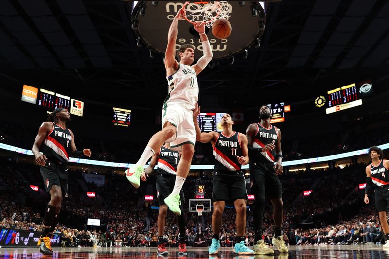 PORTLAND, OREGON - JANUARY 31: Brook Lopez #11 of the Milwaukee Bucks dunks during the third quarter against the Portland Trail Blazers at Moda Center on January 31, 2024 in Portland, Oregon. (Photo by Steph Chambers/Getty Images)