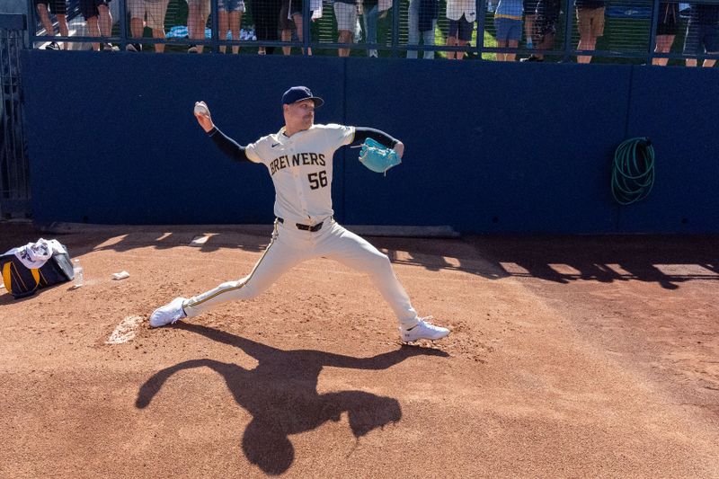 Mar 2, 2024; Phoenix, Arizona, USA; Milwaukee Brewers pitcher Janson Junk (56) readies himself during a spring training game against the Los Angeles Dodgers at American Family Fields of Phoenix. Mandatory Credit: Allan Henry-USA TODAY Sports