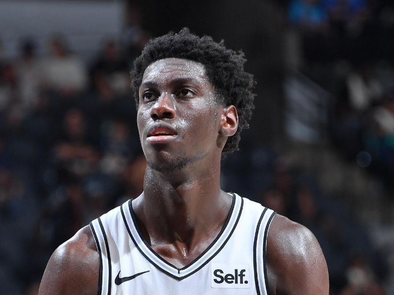 SAN ANTONIO, TX - APRIL 14: Sidy Cissoko #25 of the San Antonio Spurs shoots a free throw during the game against the Detroit Pistons on April 14, 2024 at the Frost Bank Center in San Antonio, Texas. NOTE TO USER: User expressly acknowledges and agrees that, by downloading and or using this photograph, user is consenting to the terms and conditions of the Getty Images License Agreement. Mandatory Copyright Notice: Copyright 2024 NBAE (Photos by Michael Gonzales/NBAE via Getty Images)