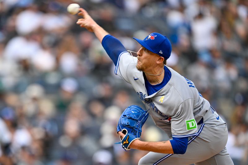 Sep 7, 2025; Bronx, New York, USA; Toronto Blue Jays relief pitcher Jeff Hoffman (23) pitches the ball during the eighth inning against the New York Yankees at Yankee Stadium. Mandatory Credit: Mark Smith-Imagn Images