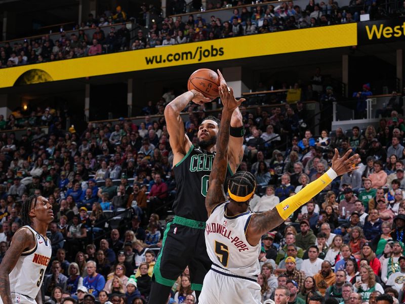 DENVER, CO - JANUARY 1: Jayson Tatum #0 of the Boston Celtics shoots the ball on January 1, 2023 at the Ball Arena in Denver, Colorado. NOTE TO USER: User expressly acknowledges and agrees that, by downloading and/or using this Photograph, user is consenting to the terms and conditions of the Getty Images License Agreement. Mandatory Copyright Notice: Copyright 2022 NBAE (Photo by Bart Young/NBAE via Getty Images)