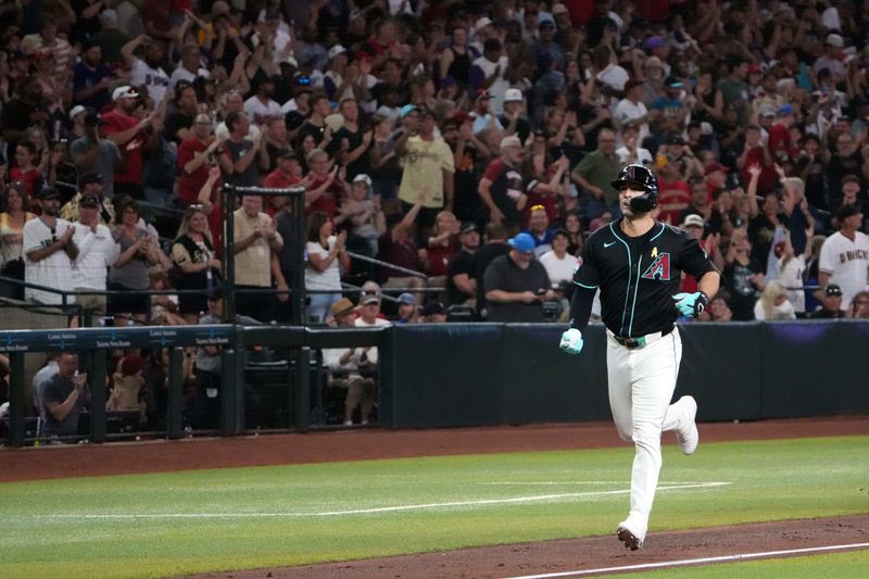 Sep 1, 2024; Phoenix, Arizona, USA; Arizona Diamondbacks outfielder Randal Grichuk (15) runs the bases after hitting a three run home run against the Los Angeles Dodgers during the second inning at Chase Field. Mandatory Credit: Joe Camporeale-USA TODAY Sports