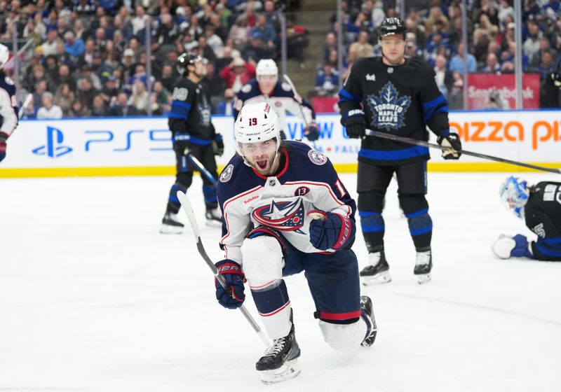 Jan 22, 2025; Toronto, Ontario, CAN; Columbus Blue Jackets center Adam Fantilli (19) celebrates scoring a goal against the Toronto Maple Leafs during the second period at Scotiabank Arena. Mandatory Credit: Nick Turchiaro-Imagn Images