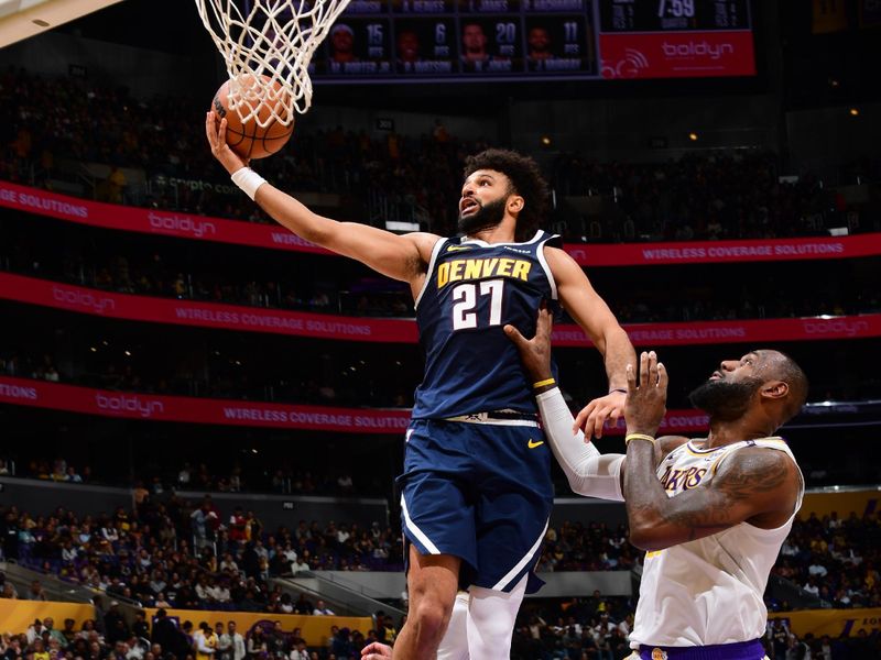 LOS ANGELES, CA - NOVEMBER 23: Jamal Murray #27 of the Denver Nuggets drives to the basket during the game against the Los Angeles Lakers on November 23, 2024 at Crypto.Com Arena in Los Angeles, California. NOTE TO USER: User expressly acknowledges and agrees that, by downloading and/or using this Photograph, user is consenting to the terms and conditions of the Getty Images License Agreement. Mandatory Copyright Notice: Copyright 2024 NBAE (Photo by Adam Pantozzi/NBAE via Getty Images)