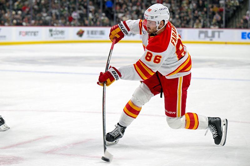 Jan 29, 2026; Saint Paul, Minnesota, USA;  Calgary Flames forward Joel Farabee (86) shoots the puck against the Minnesota Wild during the first period at Grand Casino Arena. Mandatory Credit: Nick Wosika-Imagn Images