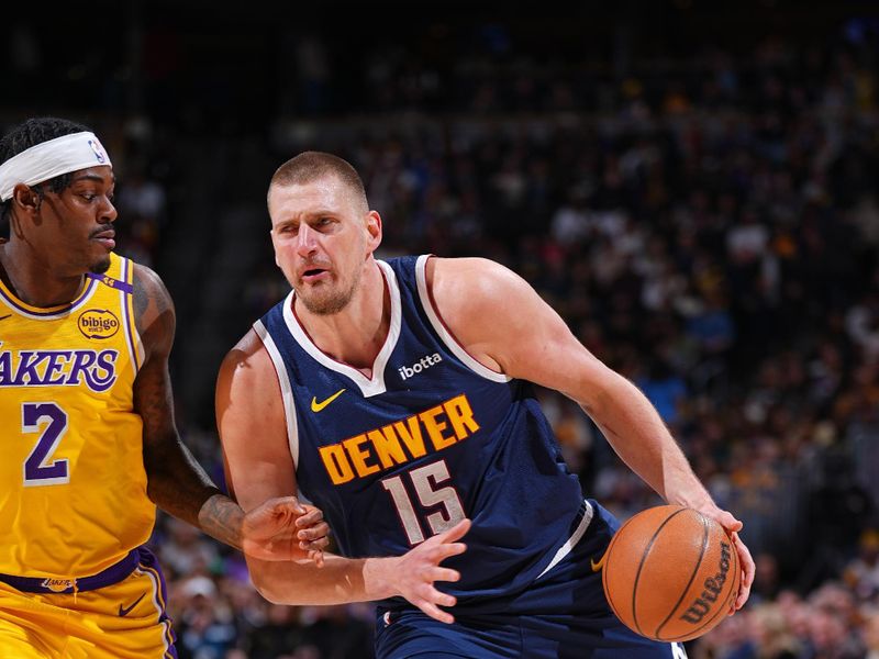 DENVER, CO - MARCH 14: Nikola Jokic #15 of the Denver Nuggets handles the ball during the game against the Los Angeles Lakers on March 14, 2025 at Ball Arena in Denver, Colorado. NOTE TO USER: User expressly acknowledges and agrees that, by downloading and/or using this Photograph, user is consenting to the terms and conditions of the Getty Images License Agreement. Mandatory Copyright Notice: Copyright 2025 NBAE(Photo by Garrett Ellwood/NBAE via Getty Images)