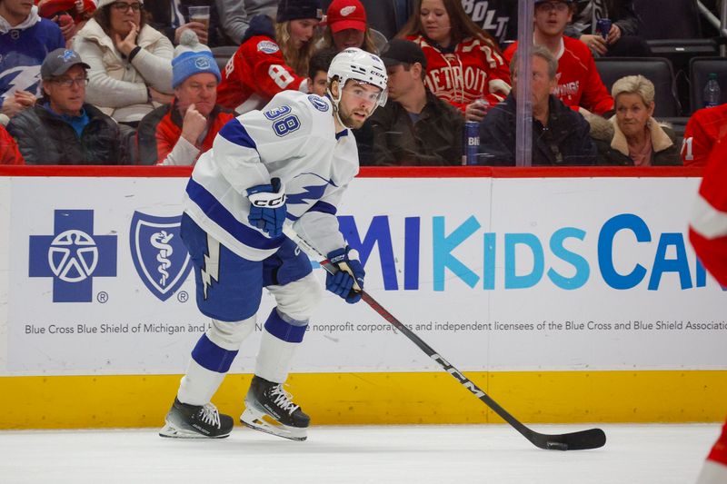 Jan 21, 2024; Detroit, Michigan, USA; Tampa Bay Lightning left wing Brandon Hagel (38) handles the puck during the third period at Little Caesars Arena. Mandatory Credit: Brian Bradshaw Sevald-USA TODAY Sports