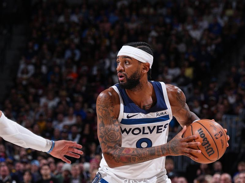 DENVER, CO - APRIL 10: Nickeil Alexander-Walker #9 of the Minnesota Timberwolves looks to pass the ball during the game against the Denver Nuggets on April 10, 2024 at the Ball Arena in Denver, Colorado. NOTE TO USER: User expressly acknowledges and agrees that, by downloading and/or using this Photograph, user is consenting to the terms and conditions of the Getty Images License Agreement. Mandatory Copyright Notice: Copyright 2024 NBAE (Photo by Garrett Ellwood/NBAE via Getty Images)