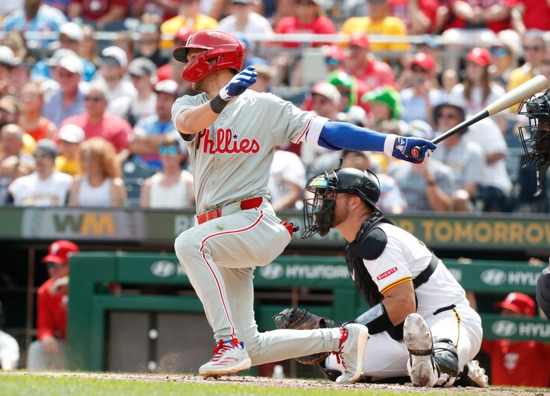 Jul 21, 2024; Pittsburgh, Pennsylvania, USA;  Philadelphia Phillies shortstop Trea Turner (7) hits an RBI single against the Pittsburgh Pirates during the seventh inning at PNC Park. The Phillies won 6-0. Mandatory Credit: Charles LeClaire-USA TODAY Sports