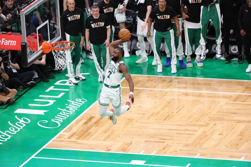 BOSTON, MA - JUNE 6: Jaylen Brown #7 of the Boston Celtics dunks the ball during the game against the Dallas Mavericks during Game 1 of the 2024 NBA Finals on June 6, 2024 at the TD Garden in Boston, Massachusetts. NOTE TO USER: User expressly acknowledges and agrees that, by downloading and or using this photograph, User is consenting to the terms and conditions of the Getty Images License Agreement. Mandatory Copyright Notice: Copyright 2024 NBAE  (Photo by Joe Murphy/NBAE via Getty Images)