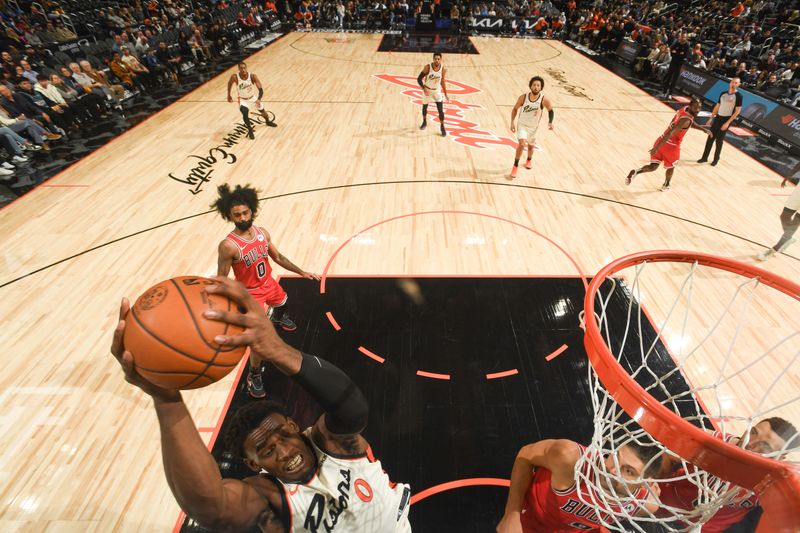 DETROIT, MI - NOVEMBER 18: Jalen Duren #0 of the Detroit Pistons drives to the basket during the game against the Chicago Bulls on November 18, 2024 at Little Caesars Arena in Detroit, Michigan. NOTE TO USER: User expressly acknowledges and agrees that, by downloading and/or using this photograph, User is consenting to the terms and conditions of the Getty Images License Agreement. Mandatory Copyright Notice: Copyright 2024 NBAE (Photo by Chris Schwegler/NBAE via Getty Images)